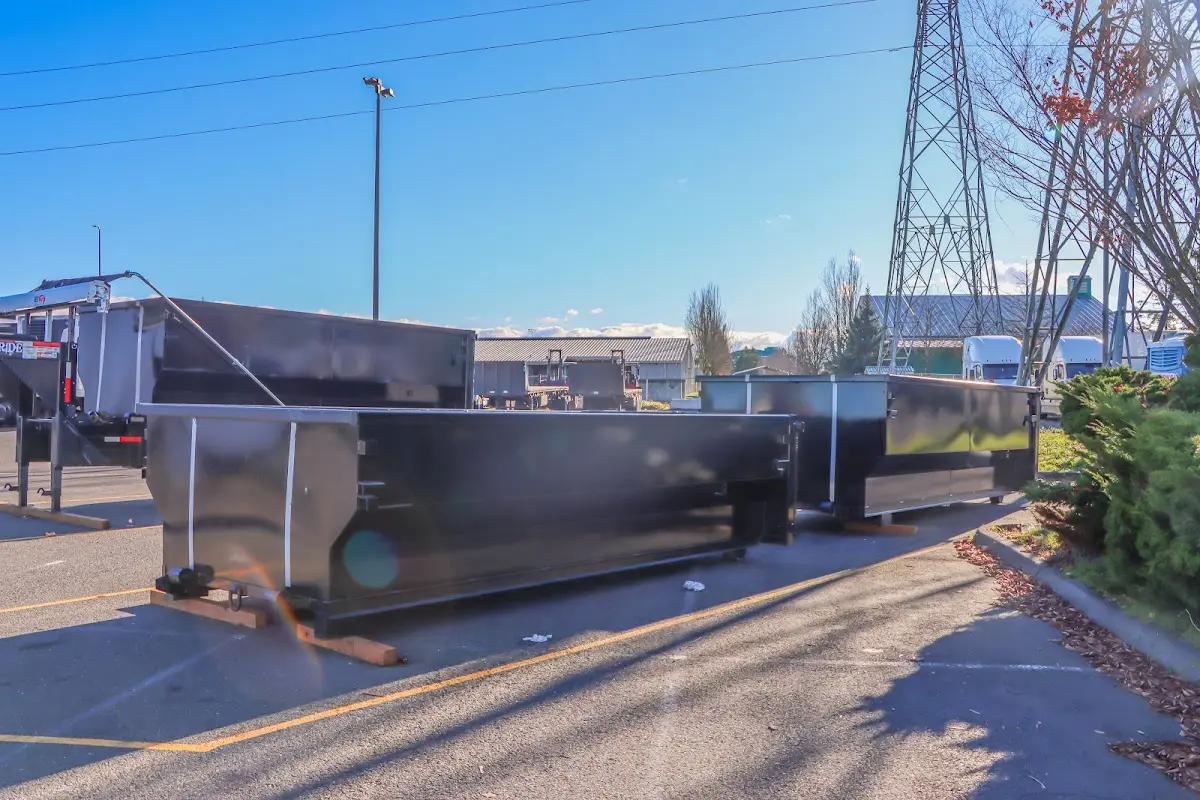 Roll-off dumpster ready for waste disposal at job site for Construction Dumpster Rental in Eagle Point